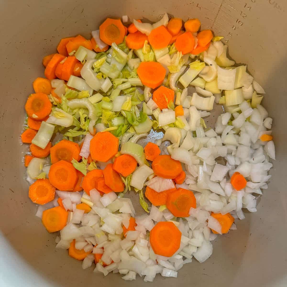 chopped onion, carrots, and celery in instant pot