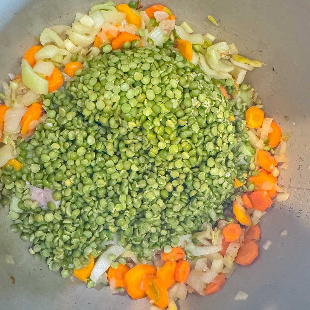 instant pot with chopped veggies and split peas