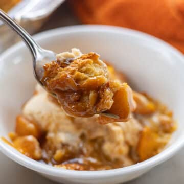 peach bread pudding in a bowl