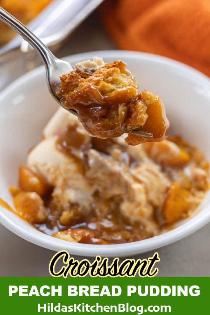 peach bread pudding in a bowl with ice cream