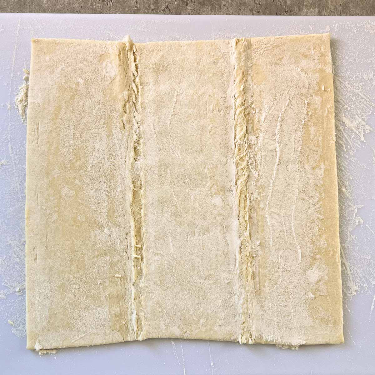 puff pastry sheet on cutting board