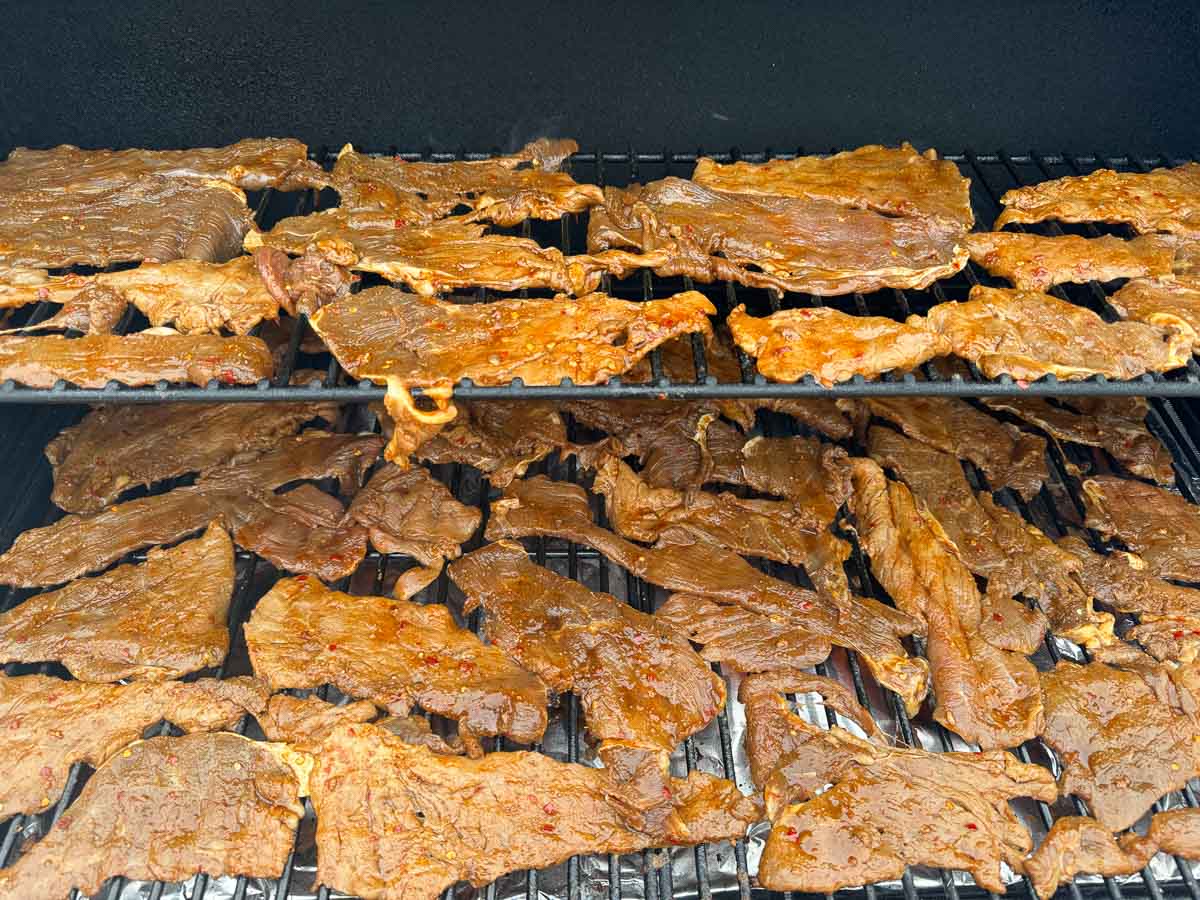 beef jerky in a smoker.