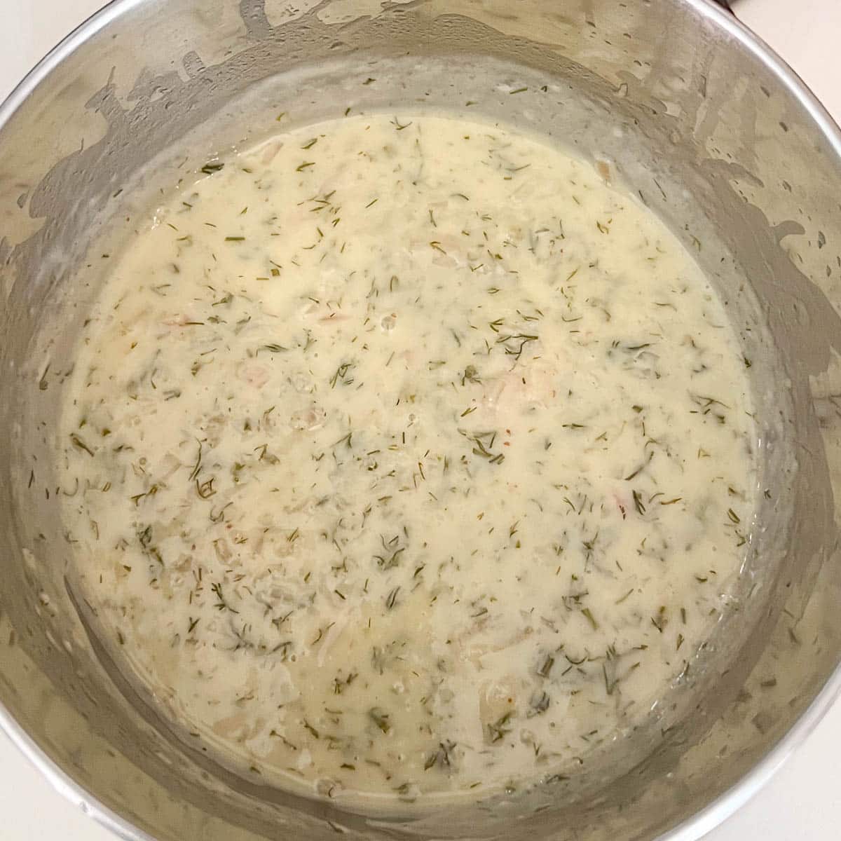 lemon and dill sauce in saucepan.