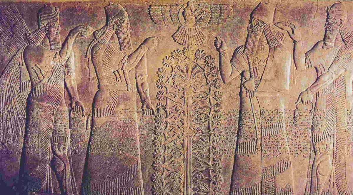 Assyrian relief showing date palm with a king and tending spirits. 
