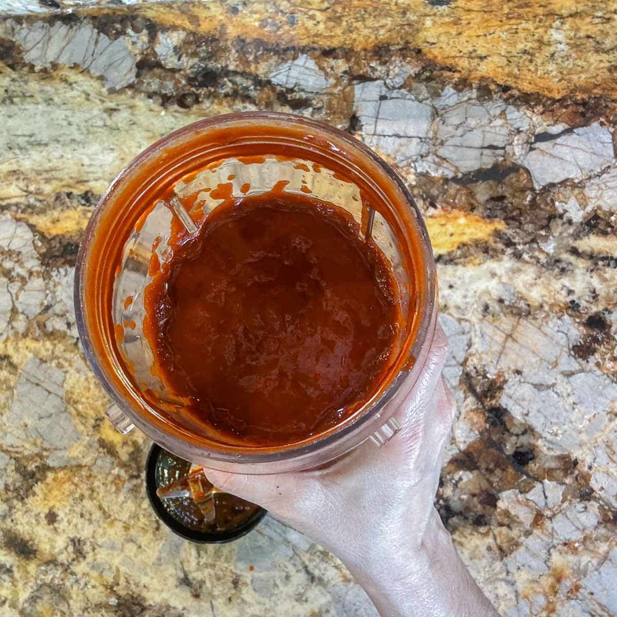 chile colorado sauce in a cup. 