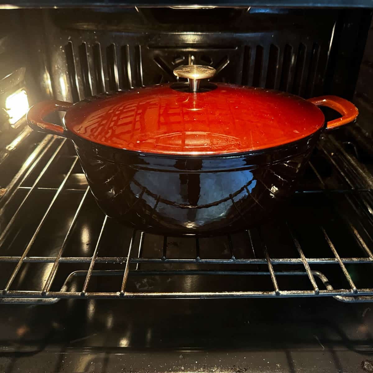 a pot with a lid in the oven. 