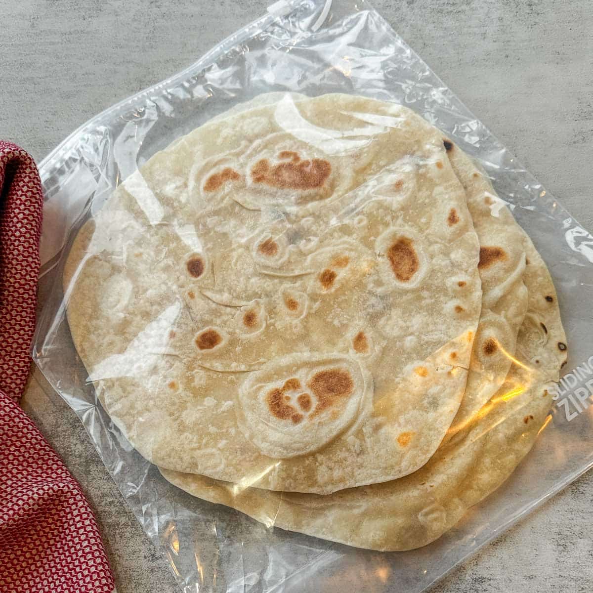 sourdough discard tortillas in a plastic bag.