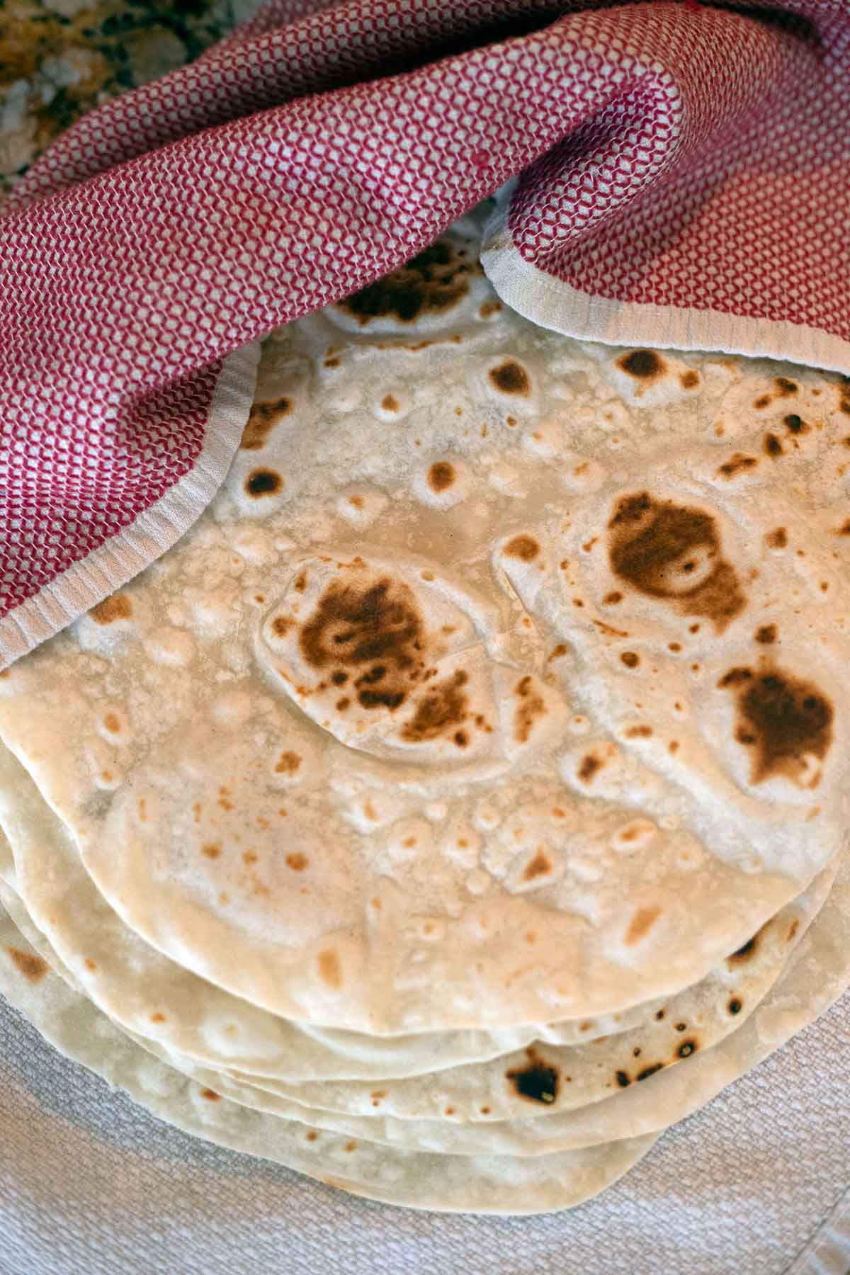 sourdough discard tortilla with a red dishtowel. 