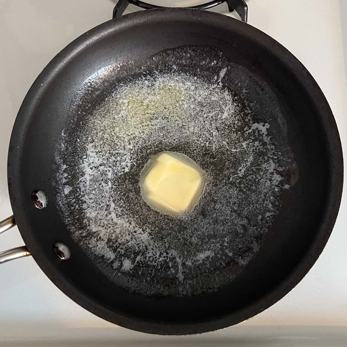 butter melting in pan.