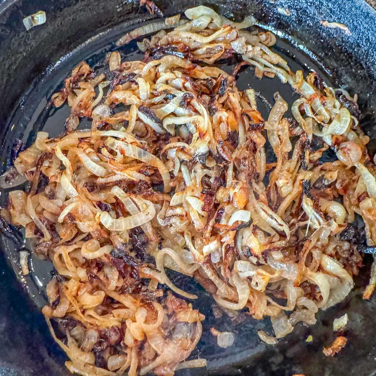 caramelized onions in a cast iron skillet.