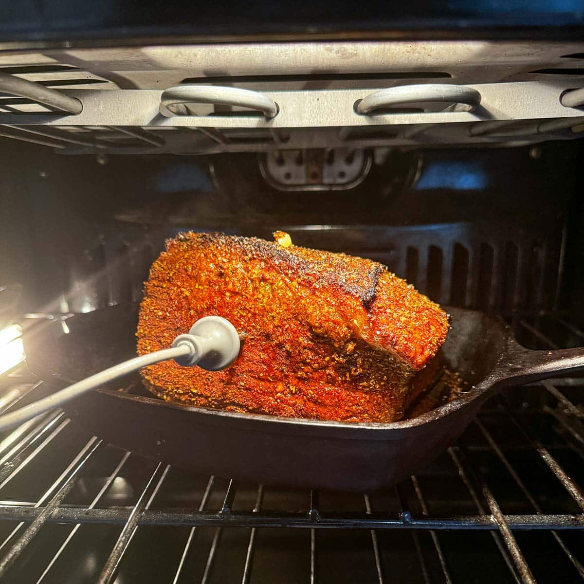 bottom round roast being baked in the oven