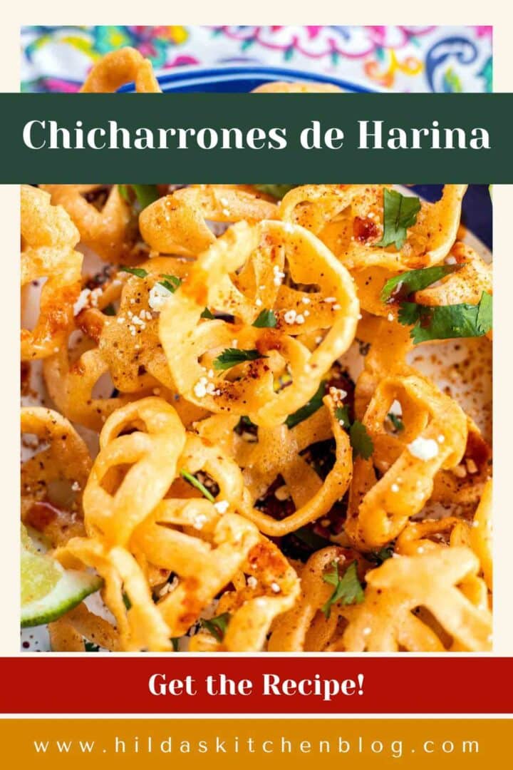 chicharrones de harina topped with cheese and cilantro.
