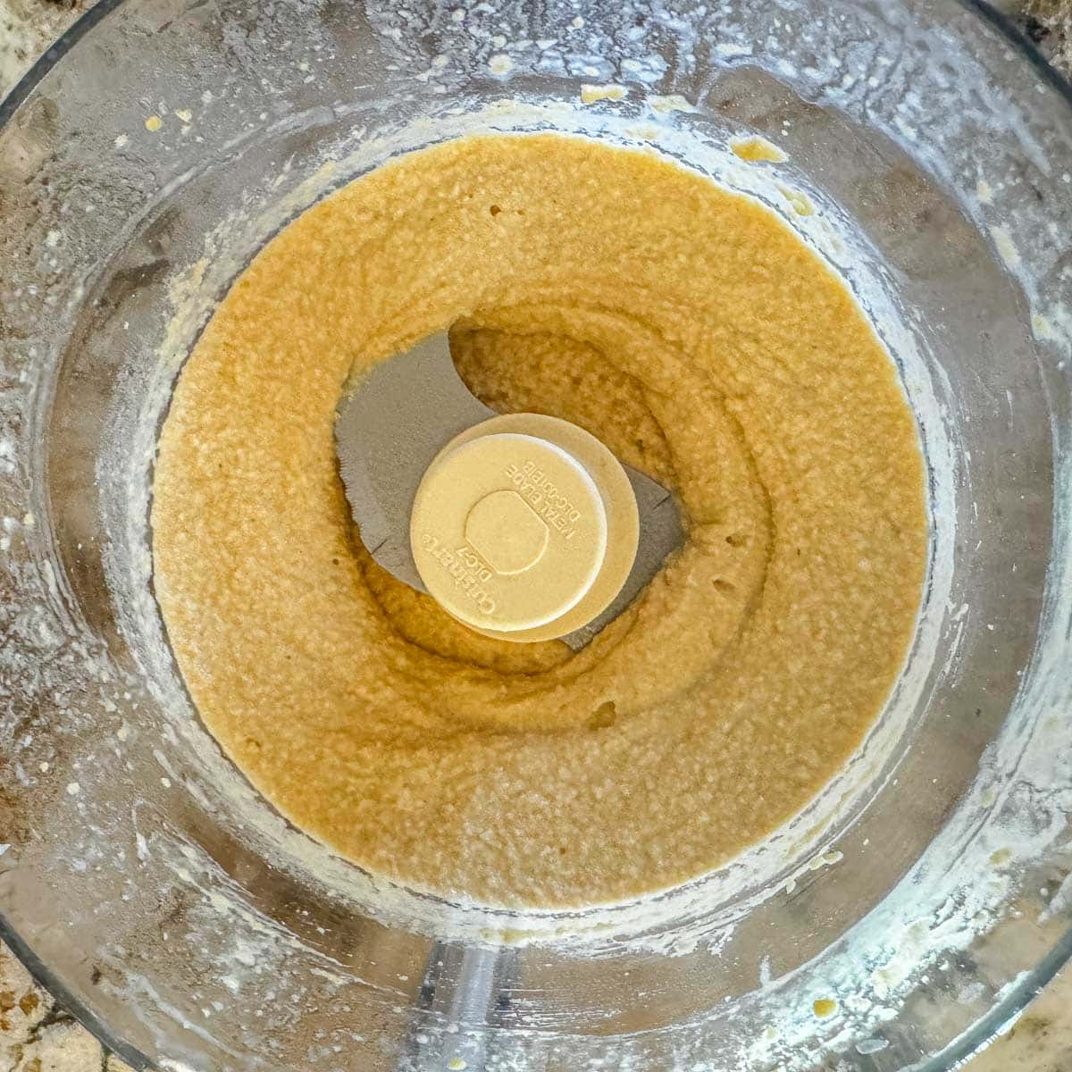 blended hummus in a food processor.