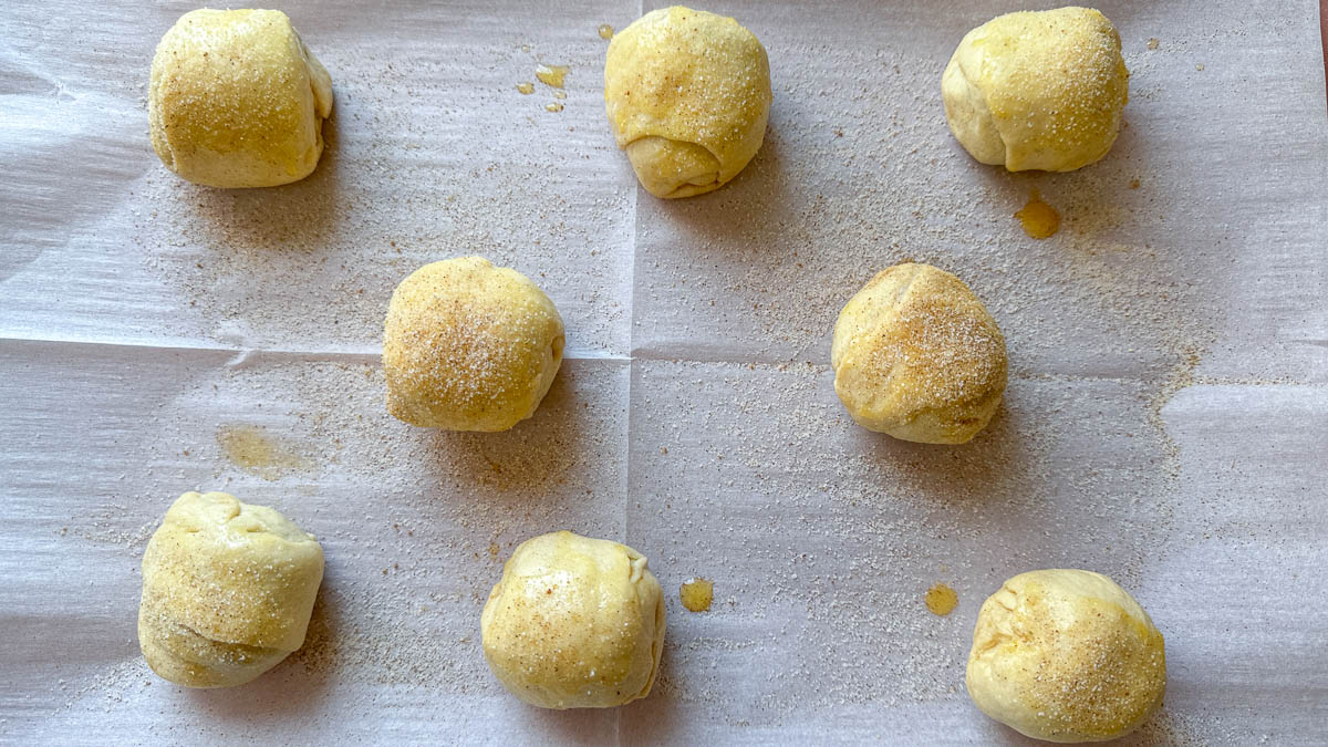 resurrection rolls unbaked on cookie sheet.