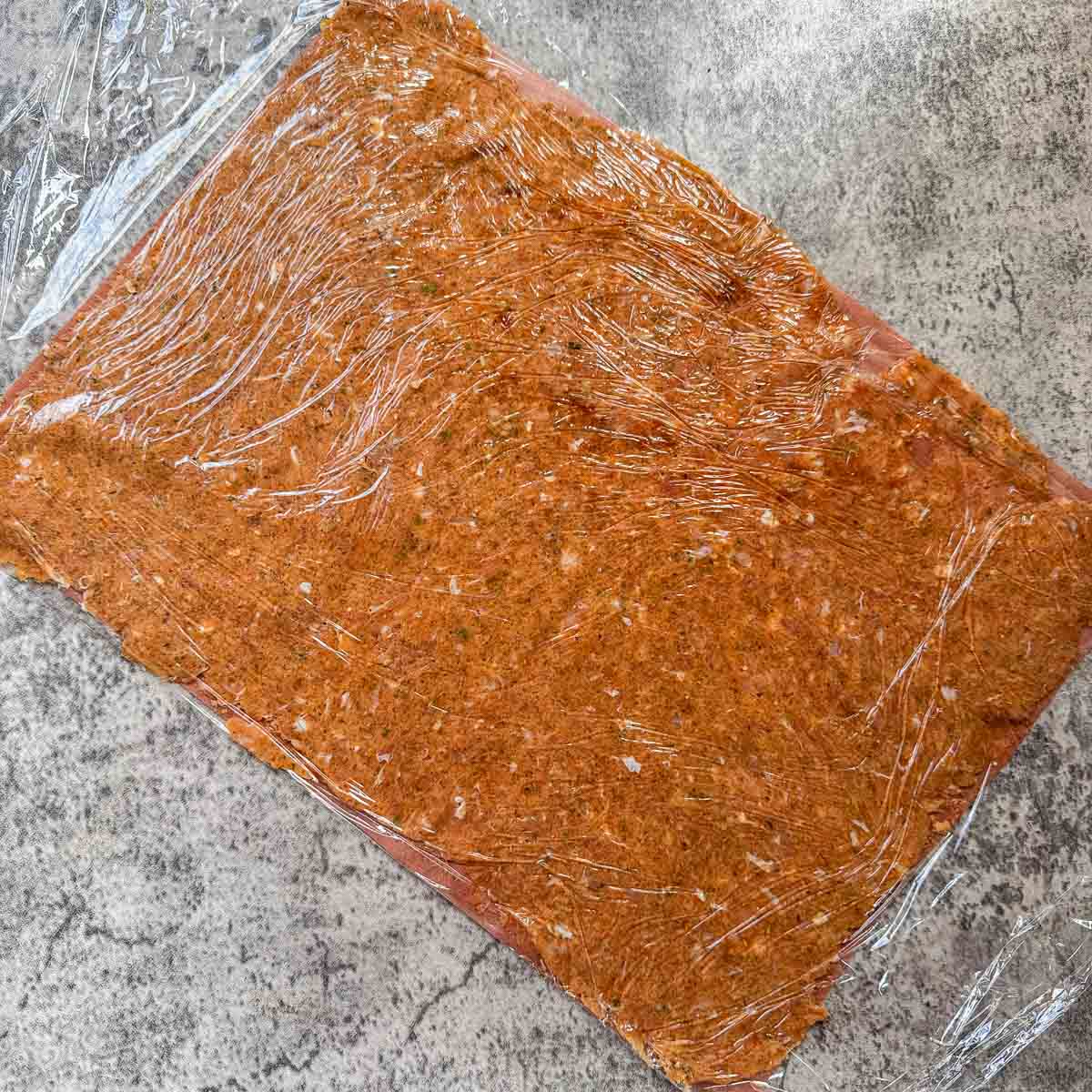 chicken gyro meat rolled into a thin layer.