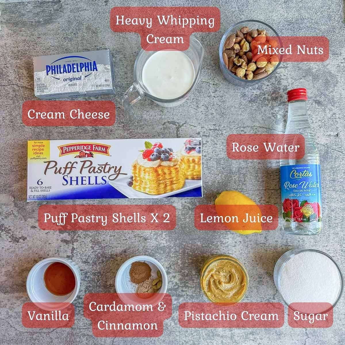 baklava cheesecake ingredients including cream cheese, sugar, nuts, puff pastry, seasoning.
