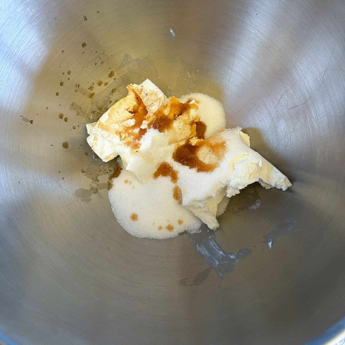 cheesecake ingredients in a mixing bowl.