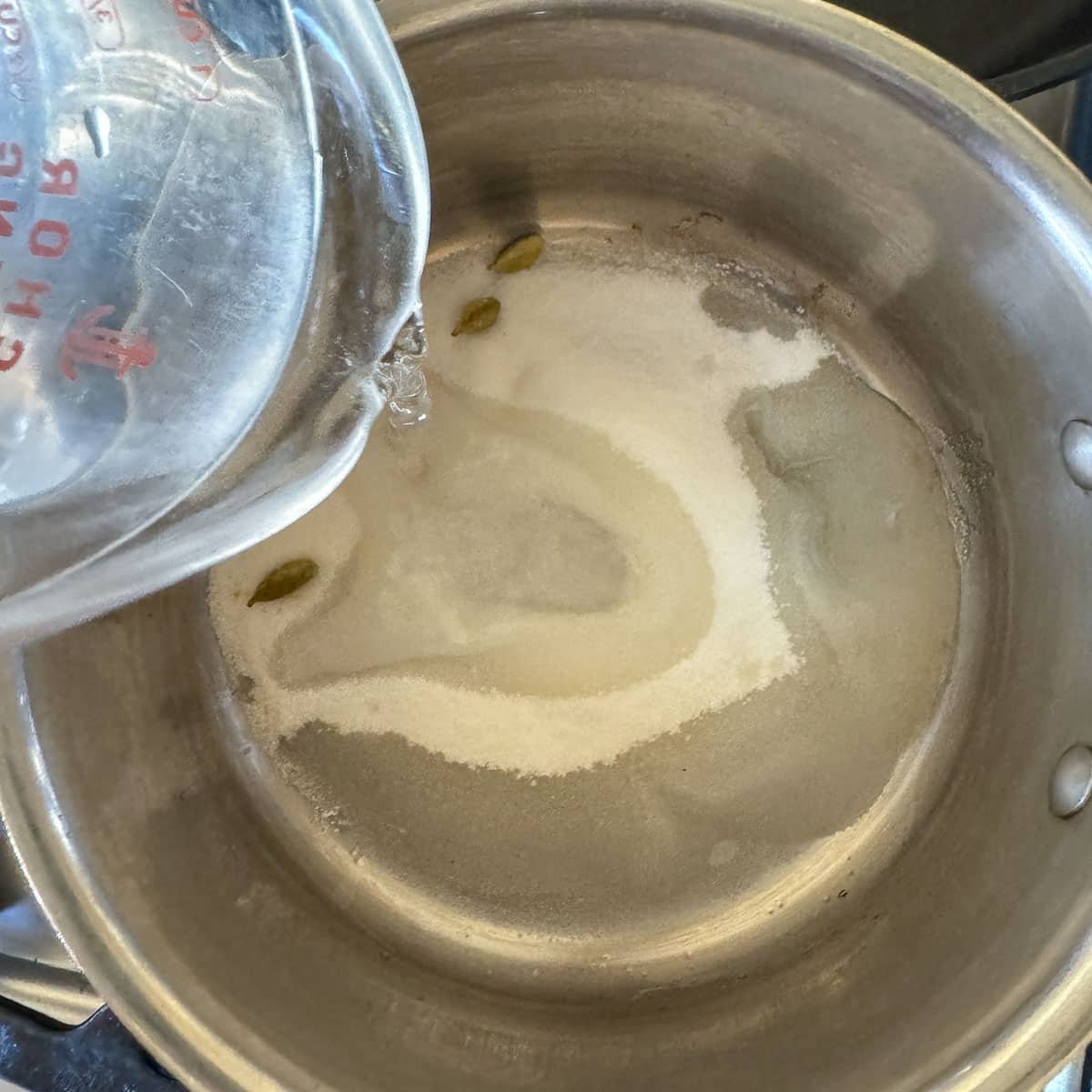 making syrup with water and sugar.