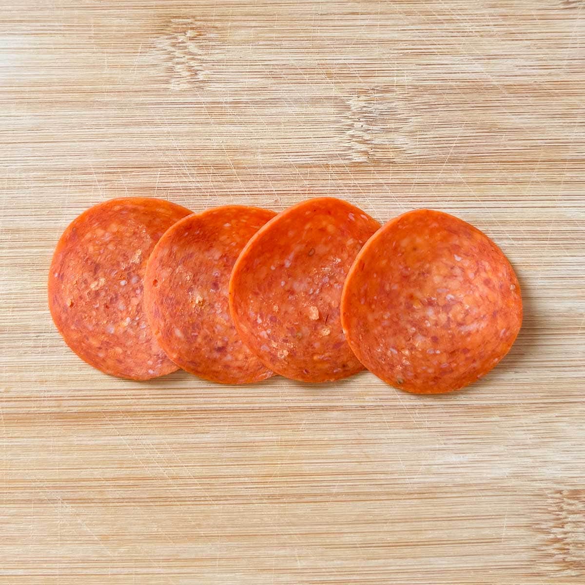 pepperoni slices overlapping one another.