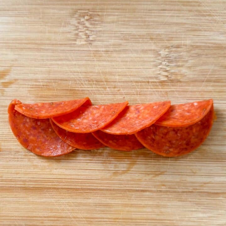 overlapped and folded pepperoni slices.