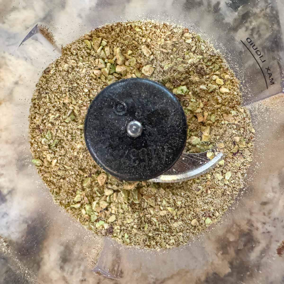 ground pistachios in a mixing bowl.