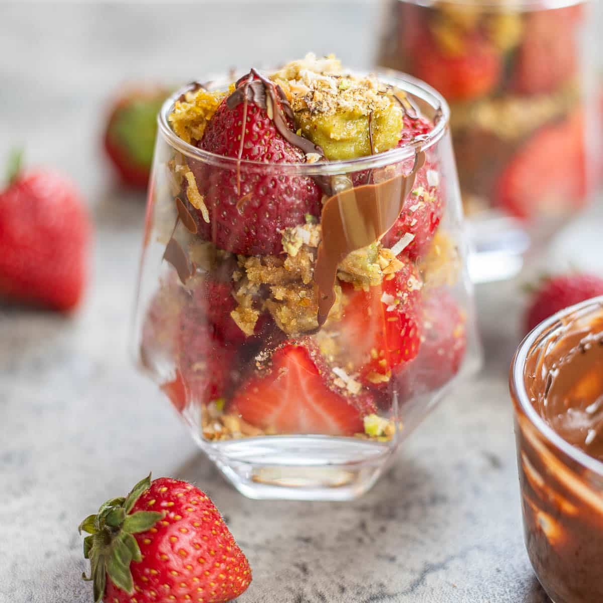 Dubai chocolate covered strawberries in a cup