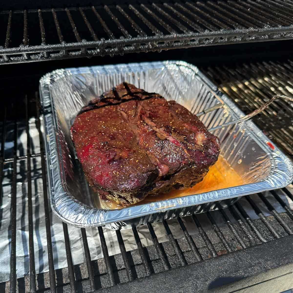 smoked chuck roast on a bbq. 