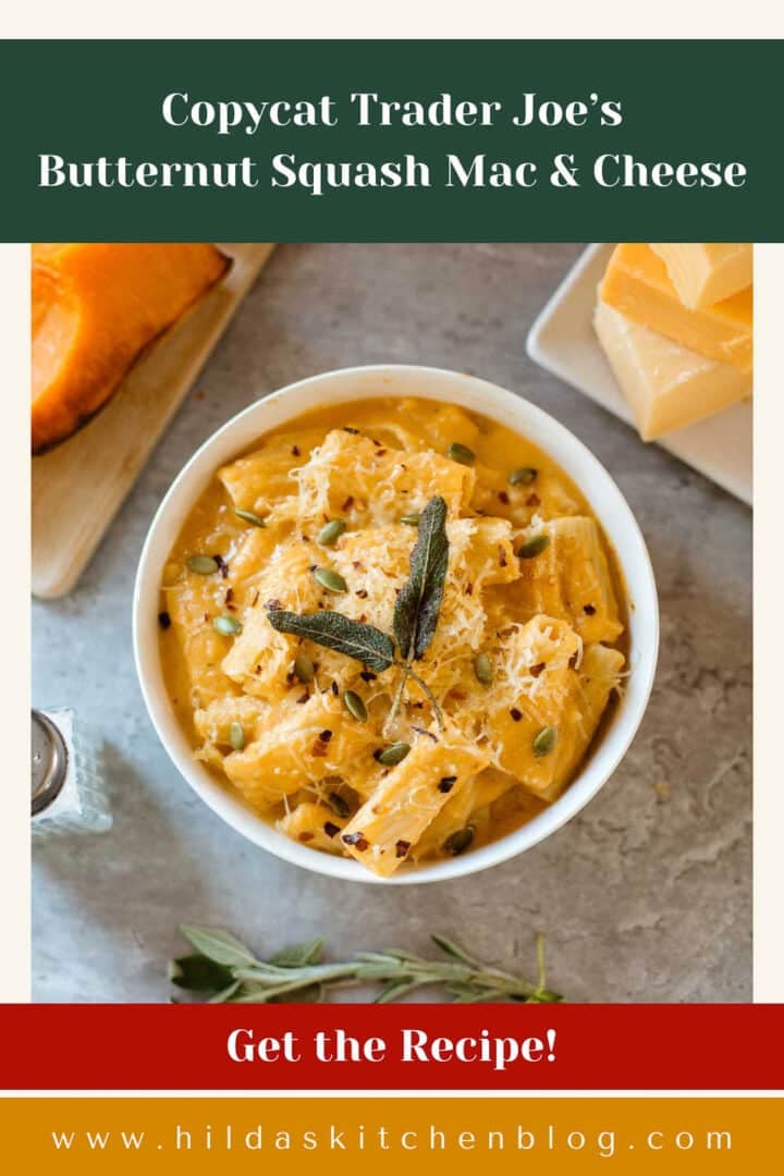 copycat trader joe's butternut squash mac and cheese in bowl surrounded by herbs, squash, cheese blocks.