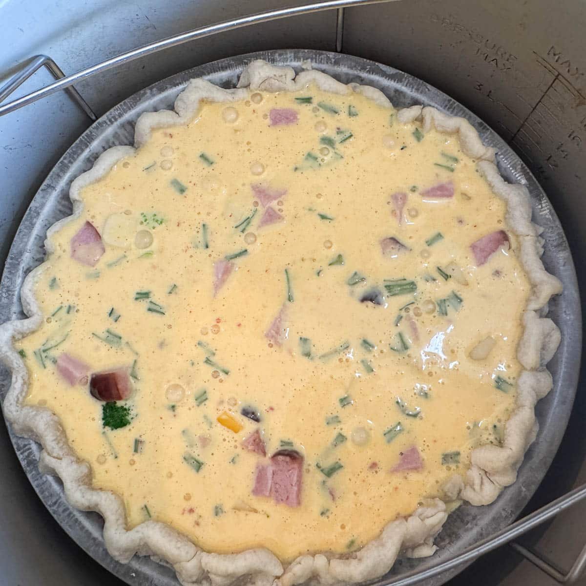 unbaked quiche in an air fryer. 
