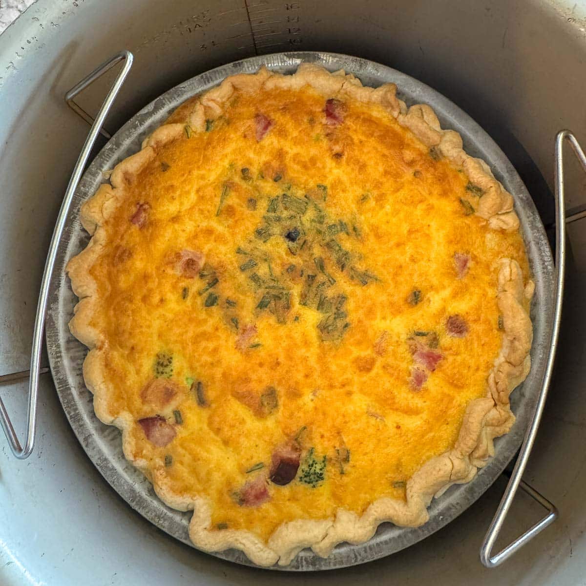 baked air fryer quiche in an air fryer. 