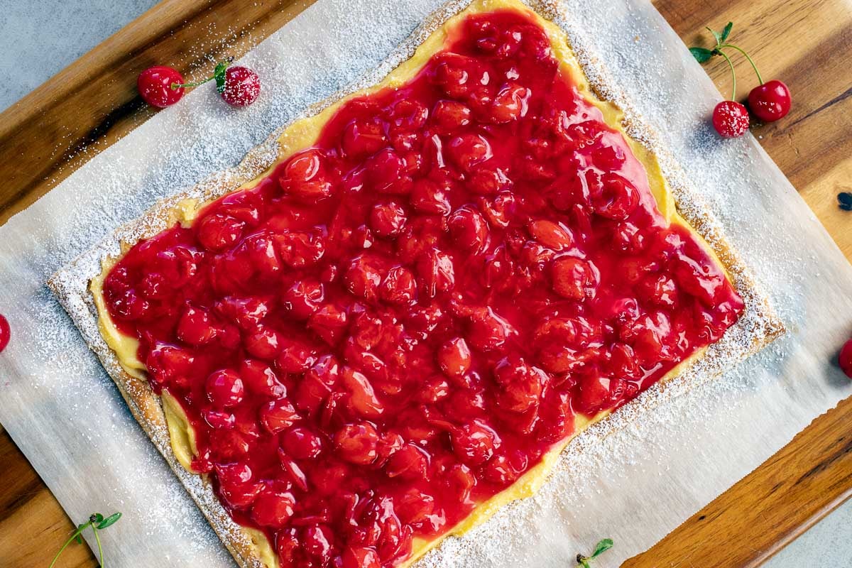 cherry tart on parchment paper. 