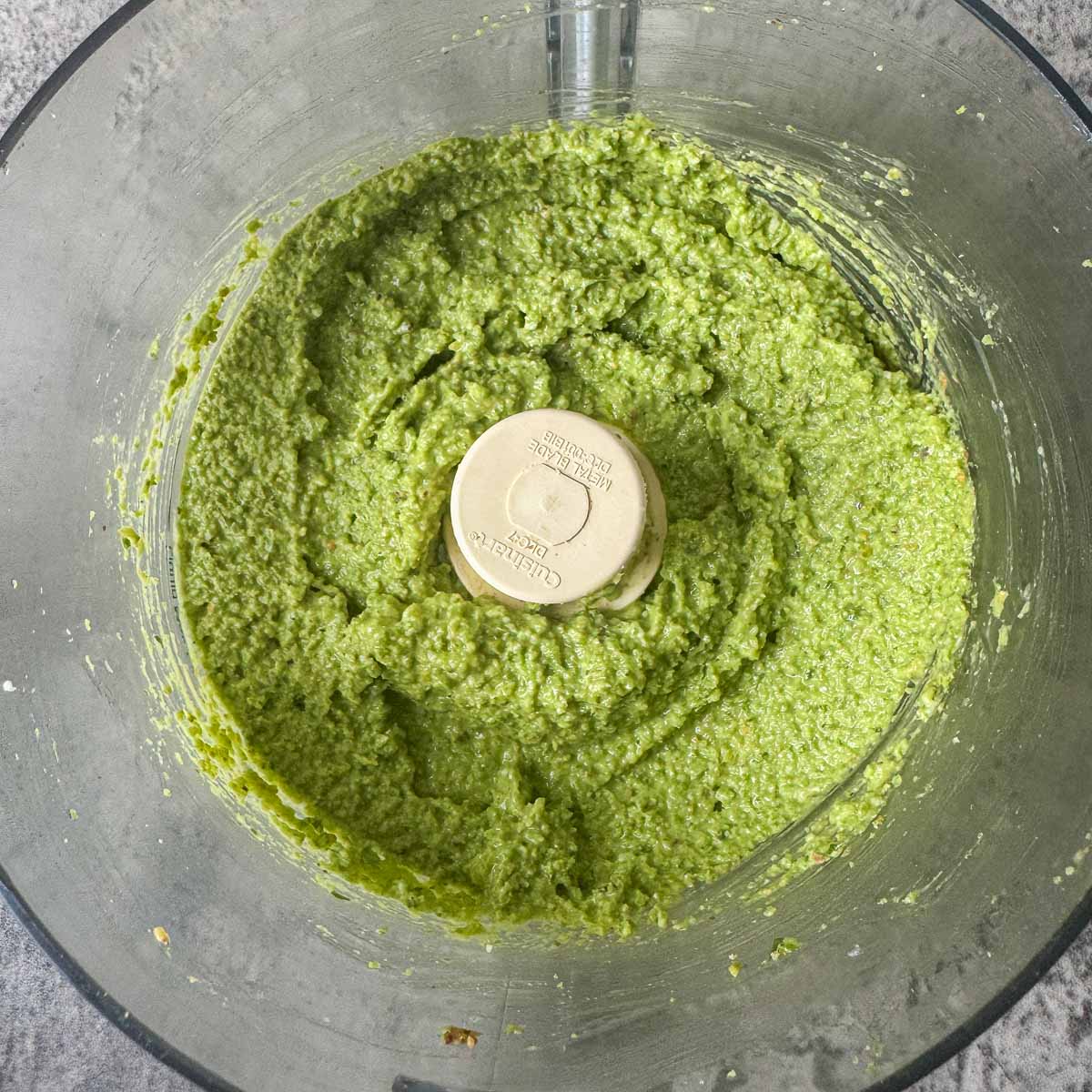 garlic scape pesto in a food processor. 