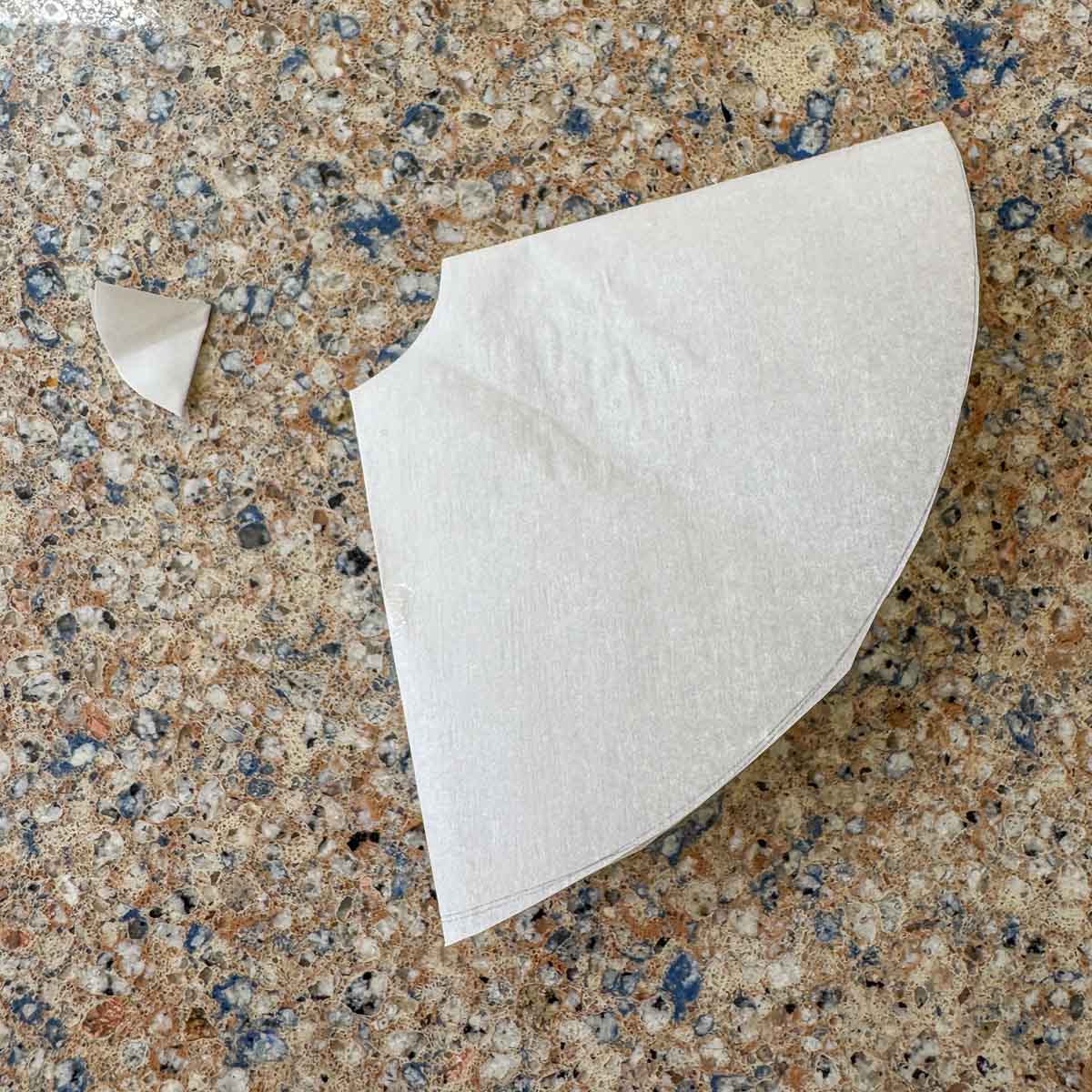 parchment papper folded and cut. 