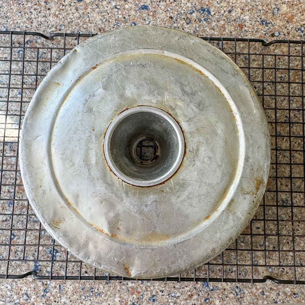 bund cake pan flipped onto cooling rack. 