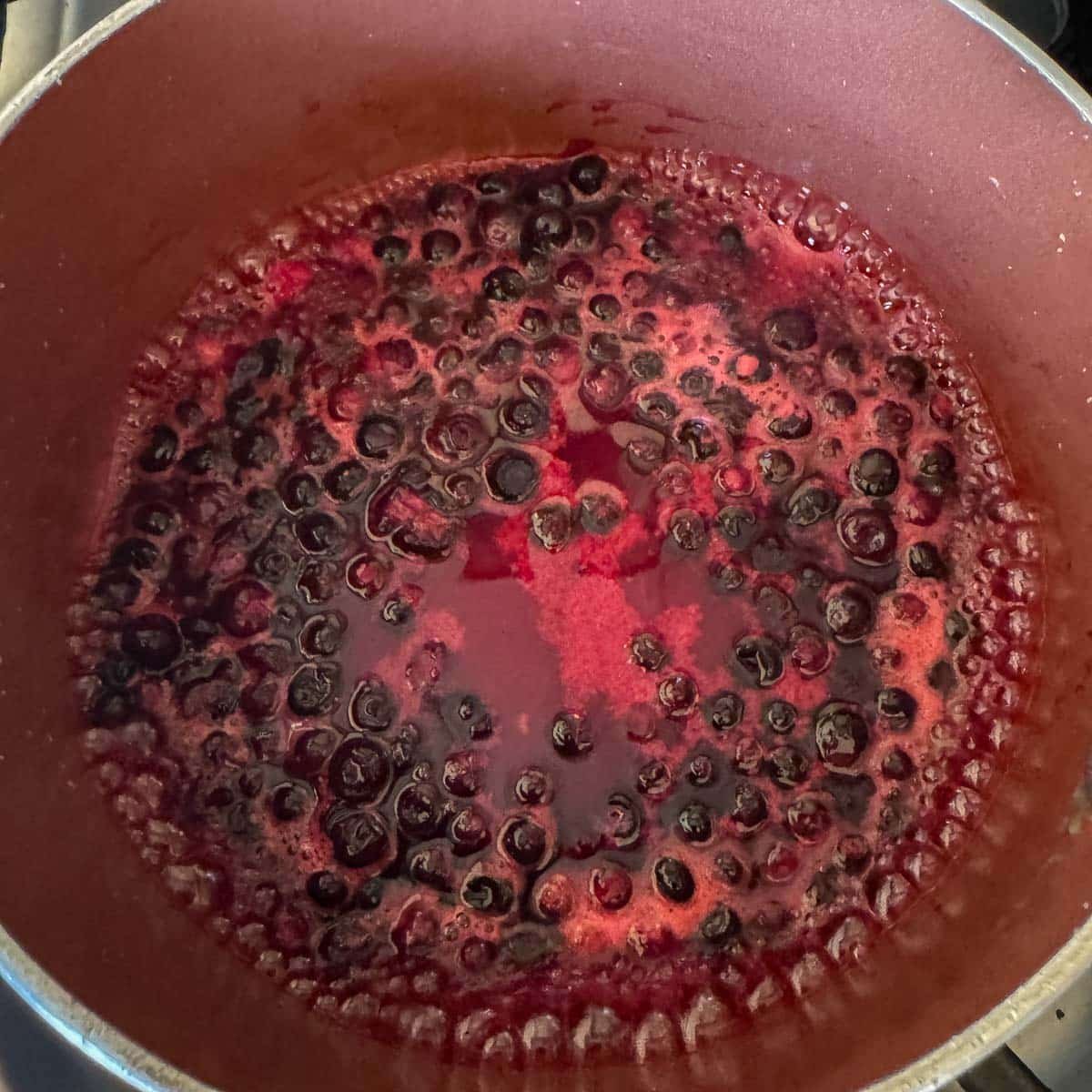 huckleberries simmering in a pot. 