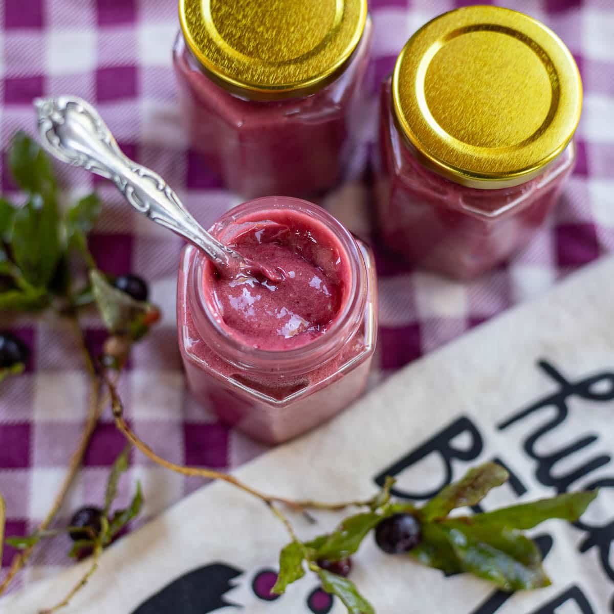 Spoonful of silky purple huckleberry curd.