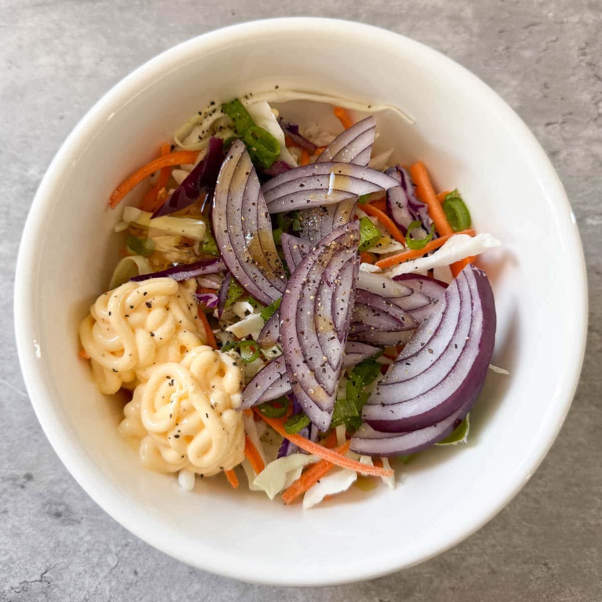 coleslaw ingredients in bowl before mixing.