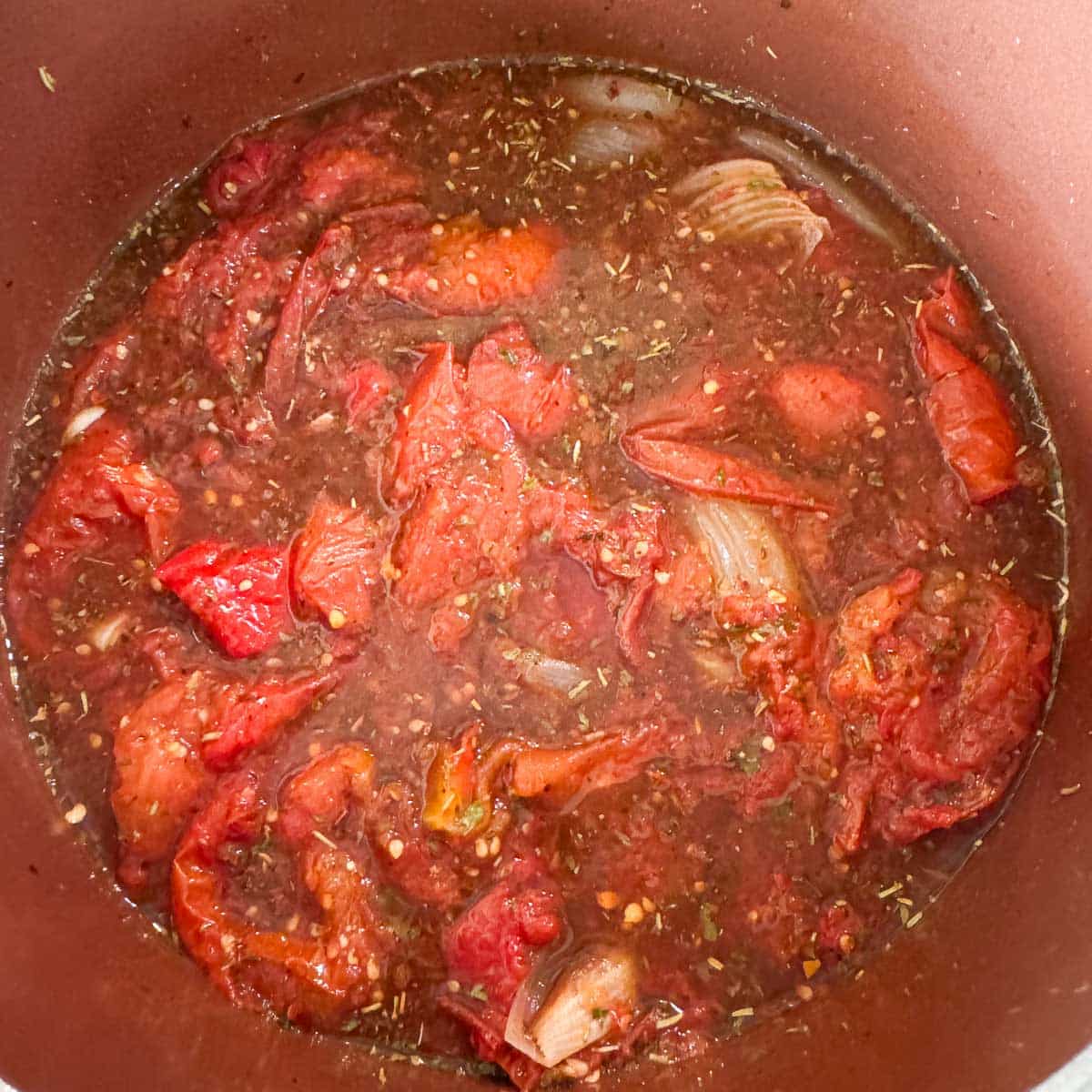 chunky roasted tomato sauce in a pot.