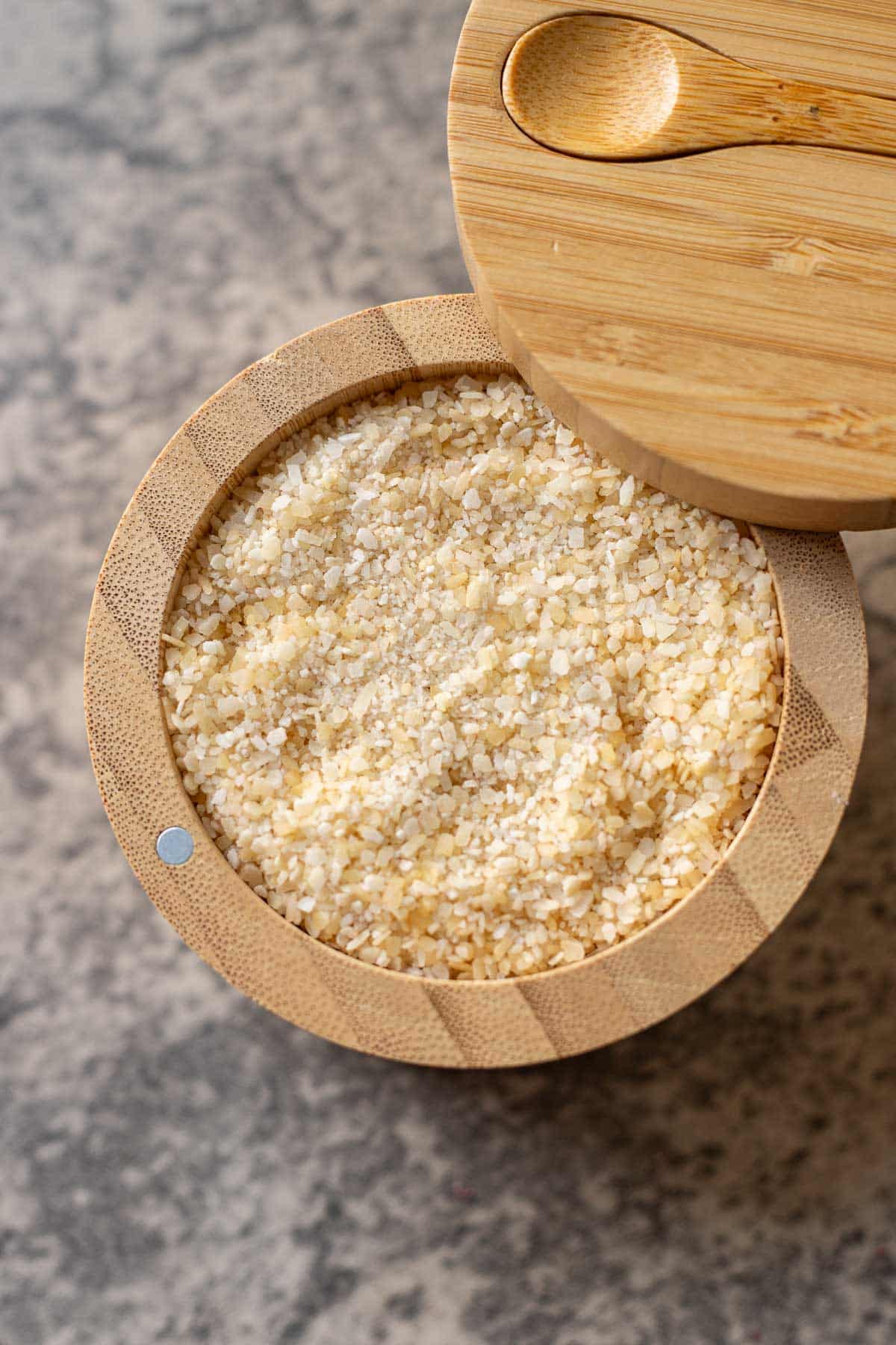 smoked salt in a bamboo salt cellar .