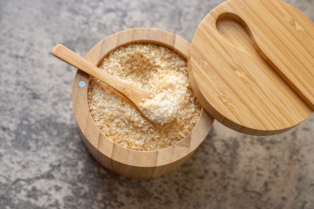 Smoked salt in a bamboo salt bowl. 