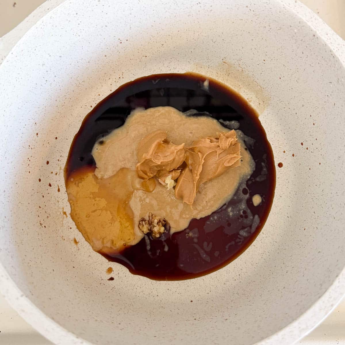 peanut sauce ingredients in pot before stirring.