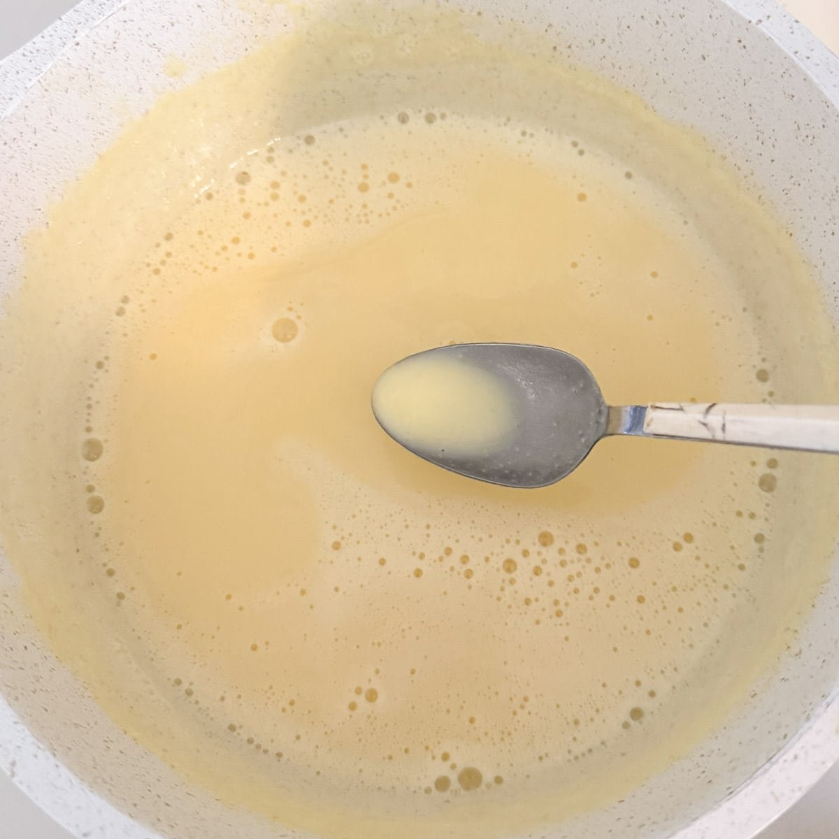 avgolemono sauce in pot after thickening.