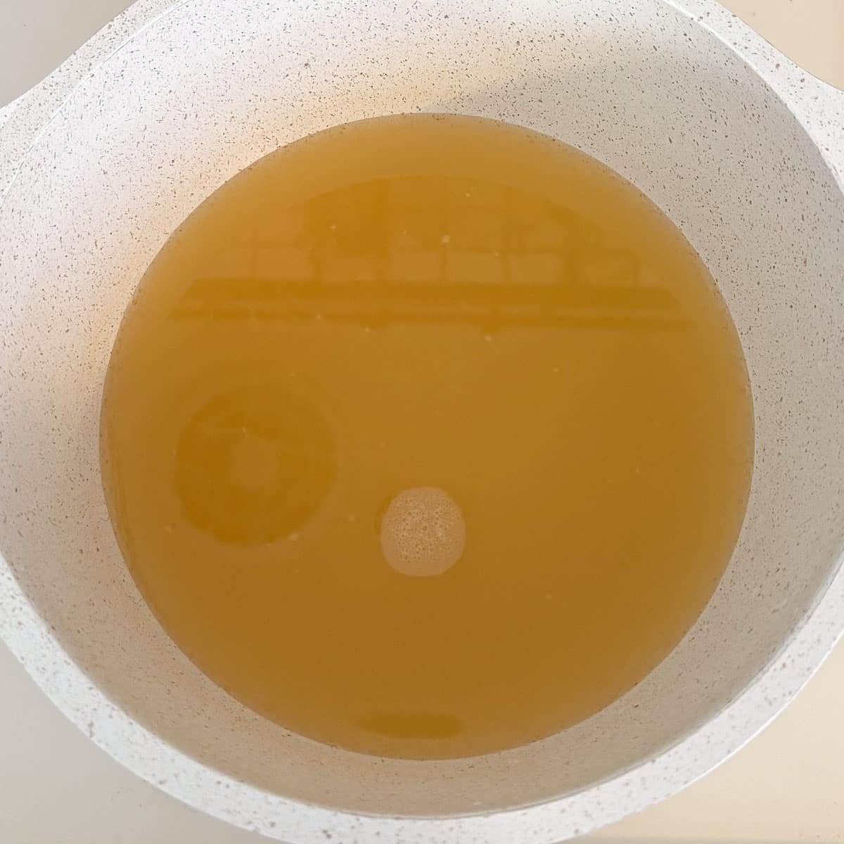 broth in saucepan.