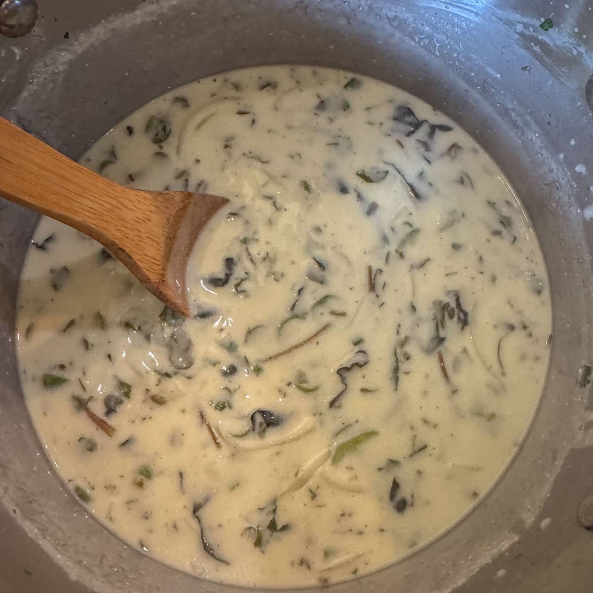 yogurt soup with a wooden spoon. 