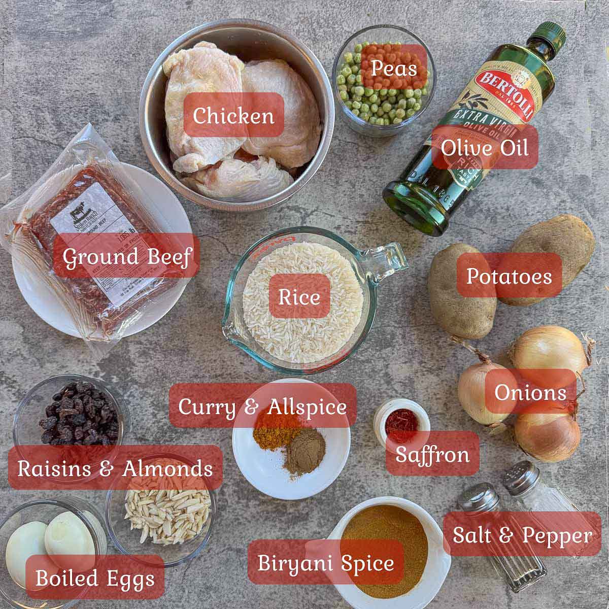 chicken biryani ingredients including chicken, rice, potatoes, onions, ground beef, & spices.