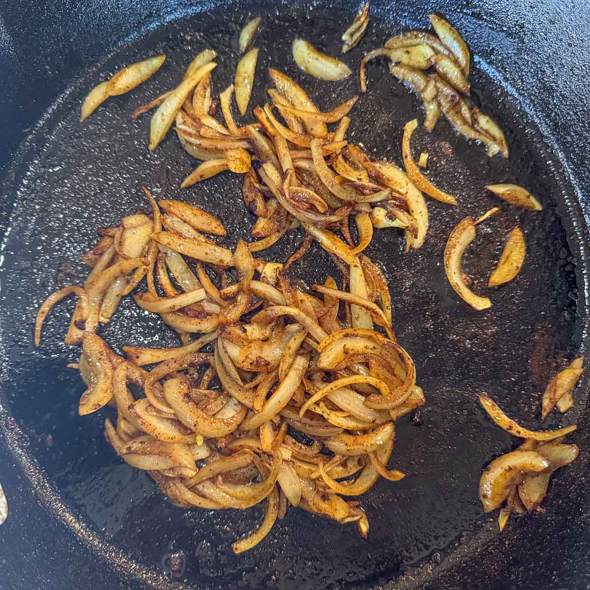 caramelized onions in a cast iron skillet.