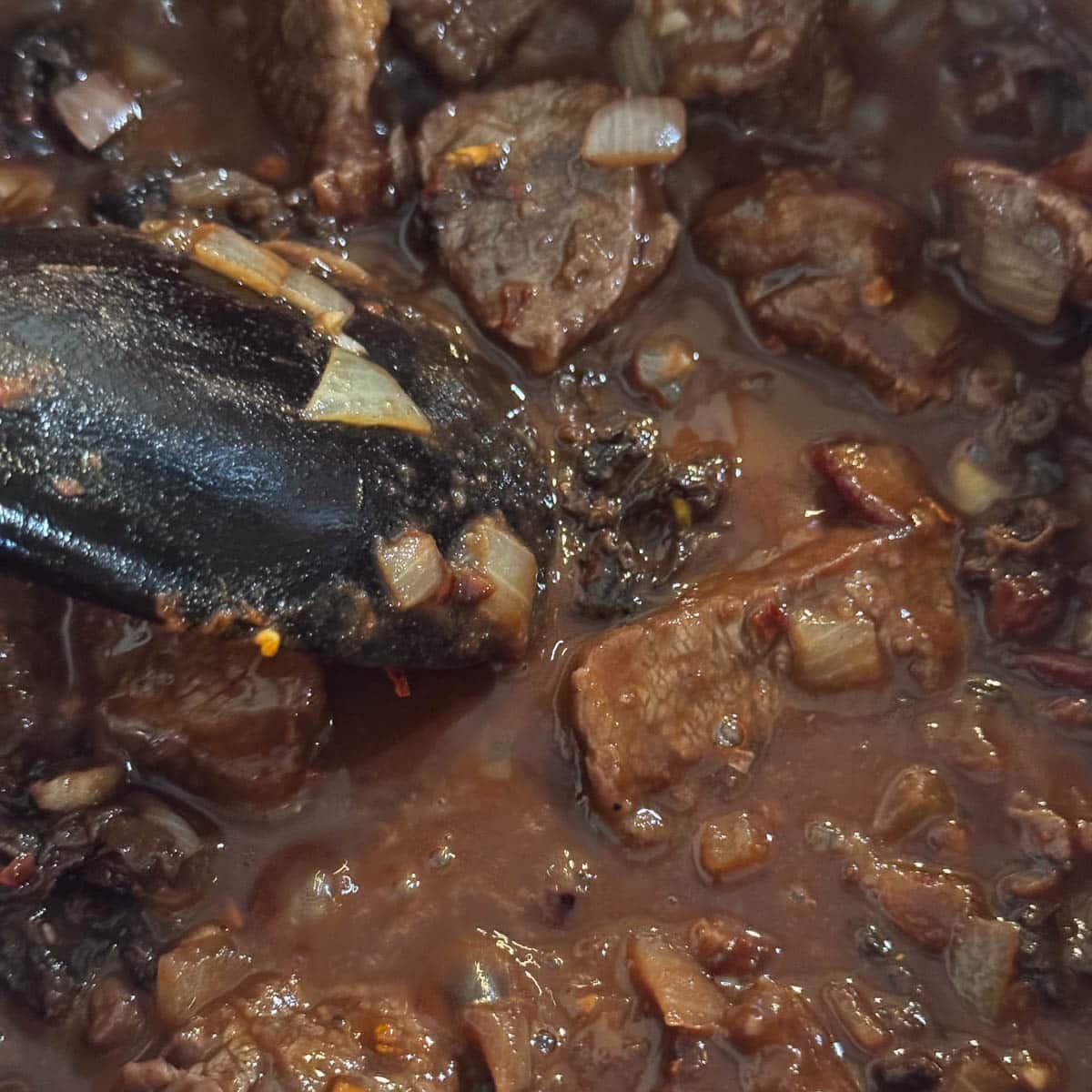 stirring meat filling for pattypan squash.
