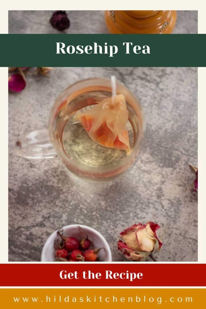 rosehip tea steeping with rosehips and dried rosehips around it.