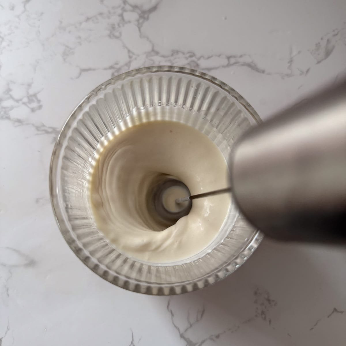 cold foam being mixed with frother.