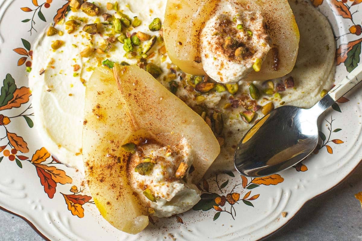 poached pears stuffed with mascarpone and pistachios.